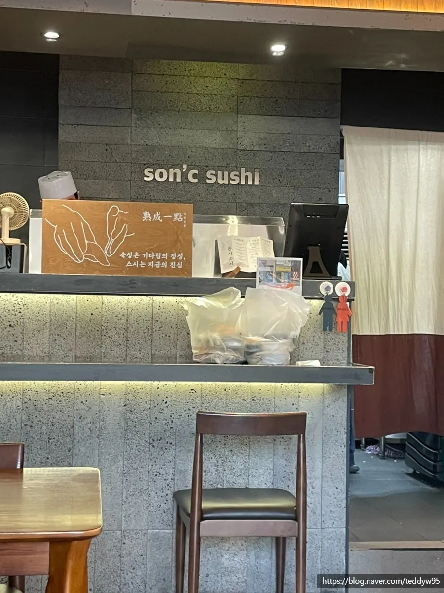Sonsi Sushi two-person tables and solo-dining seats