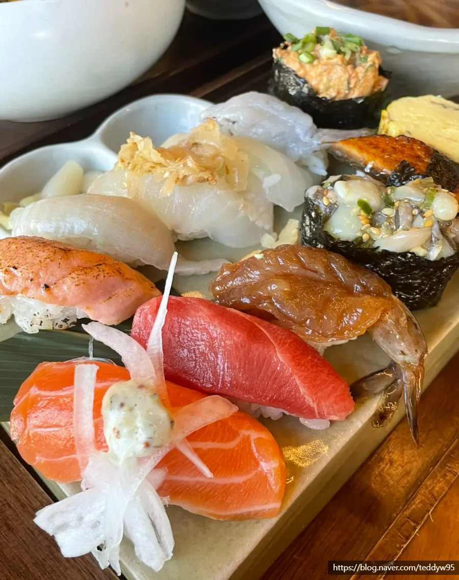 12-piece sushi topped with thick slices of fish