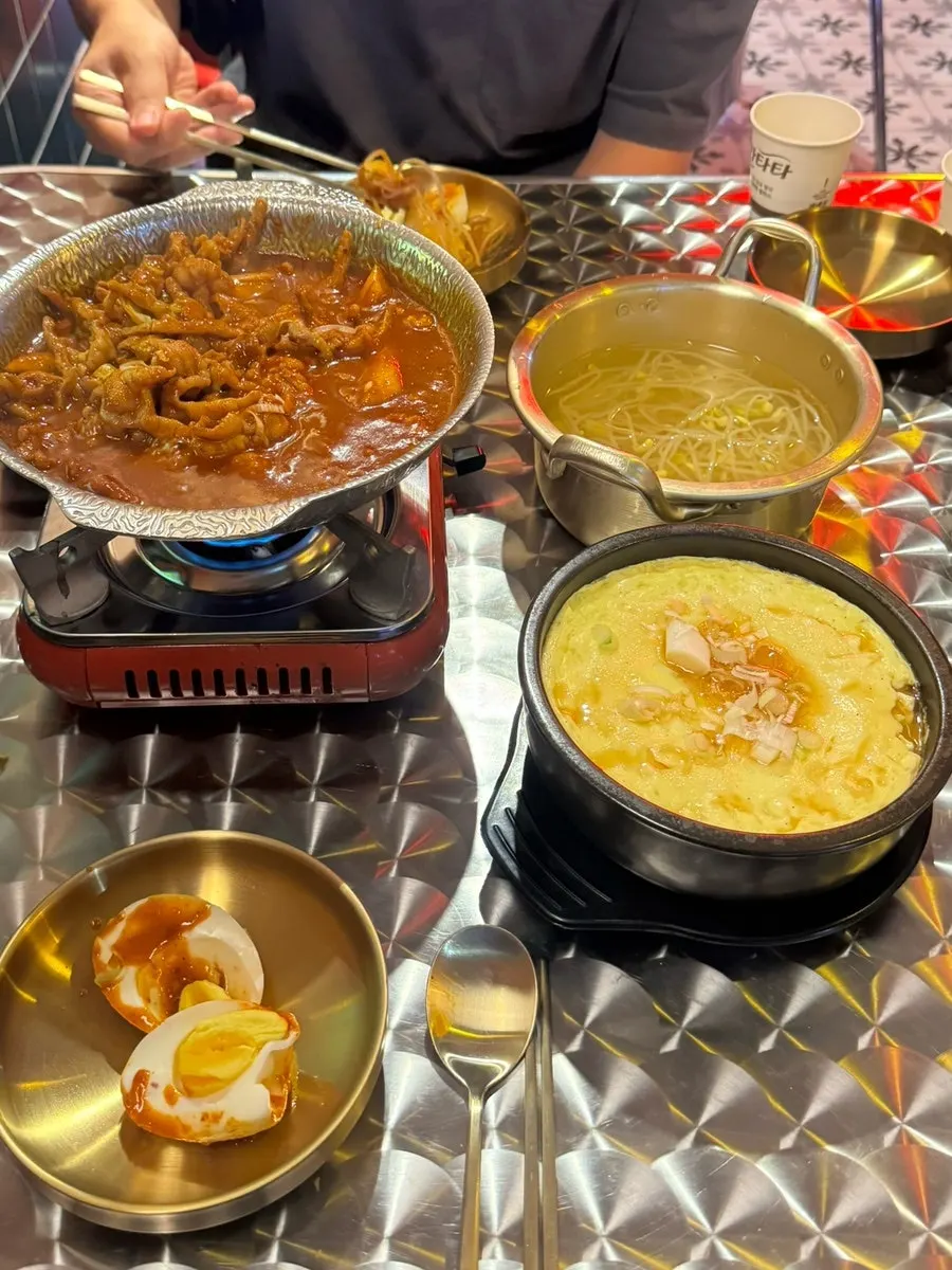 Boneless chicken feet and egg custard placed together on the table