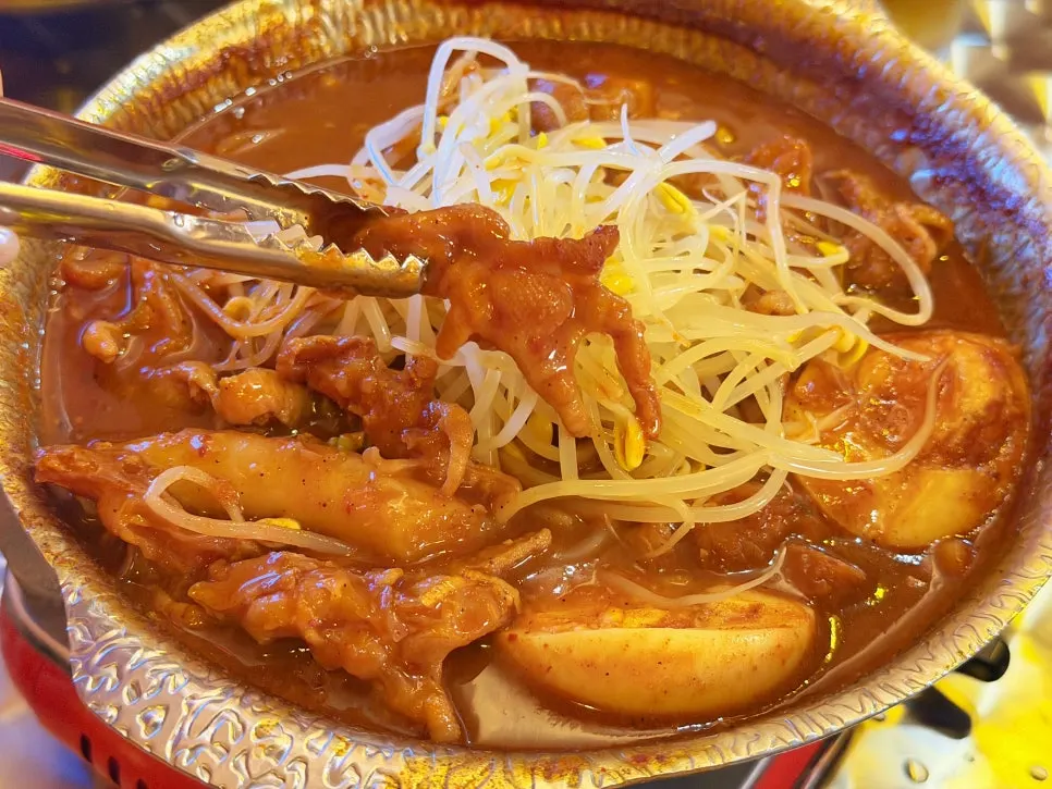 Close-up of boneless dakbal eaten straight off the bone