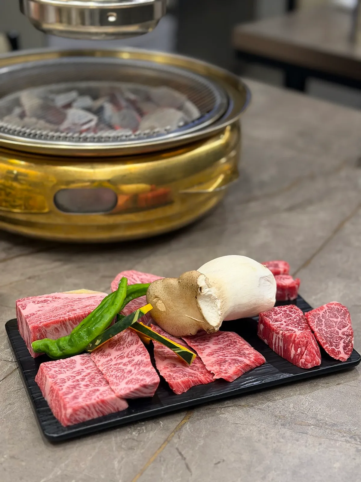 Hanwoo assorted platter with myeongi namul and other basic side dishes at Yeongpo Hwa-ro