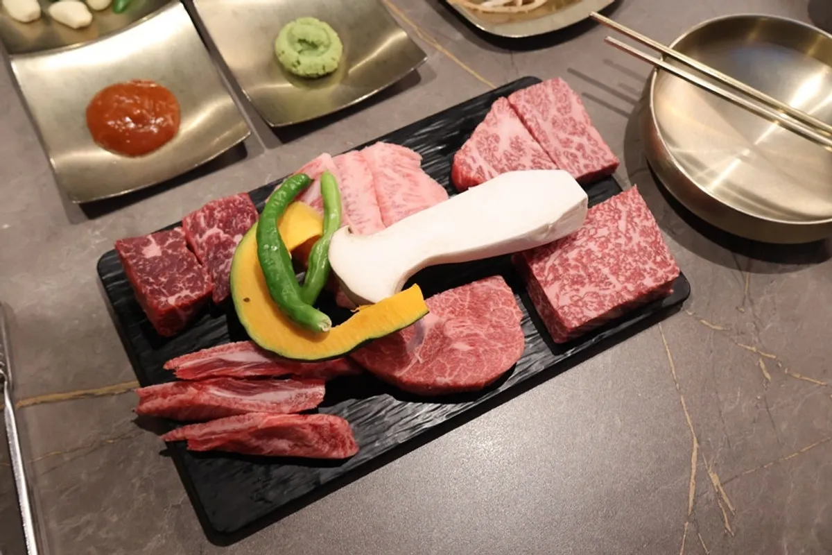Charcoal grill set on the table at Yeongpo Hwa-ro Ingye Branch