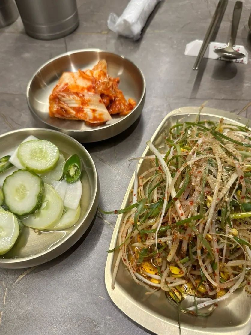Charcoal-filled brazier grill at Yeongpo Hwa-ro
