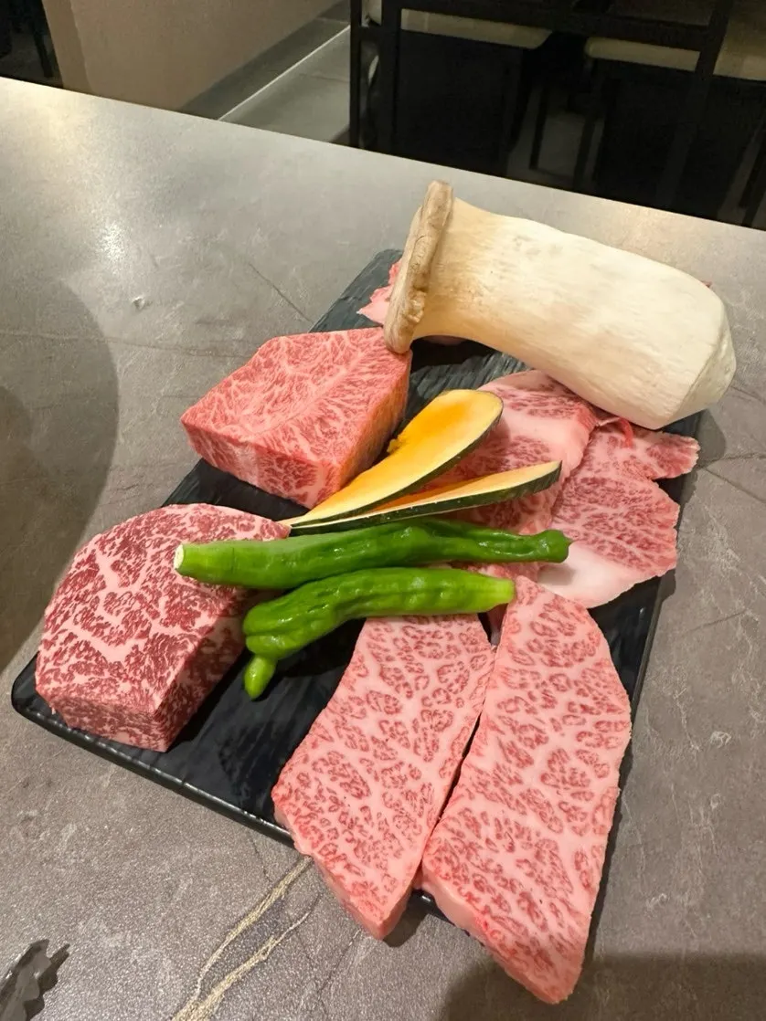 Ssamjang, wasabi, salt and assorted kimchi side dishes