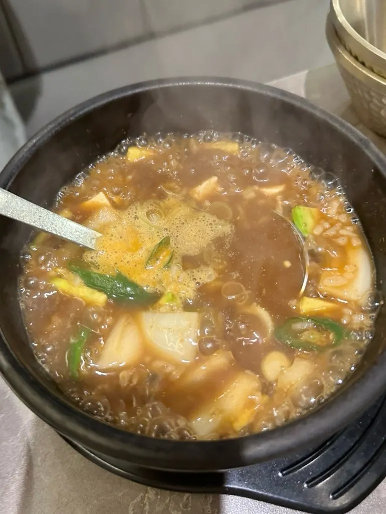 Hanwoo grilled meat eaten with scallion salad