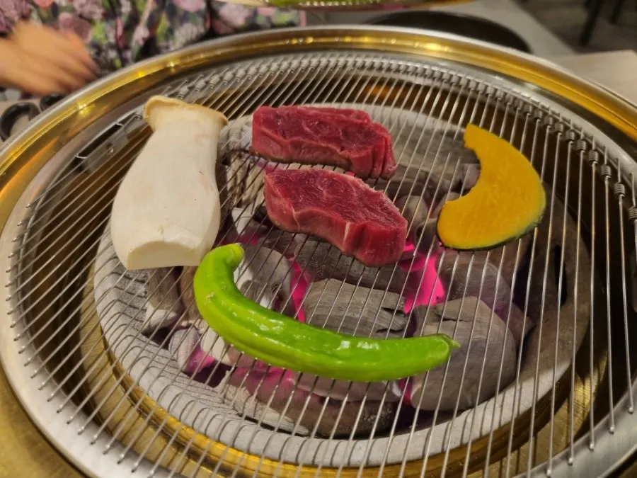 Hanwoo grilling on the charcoal grill