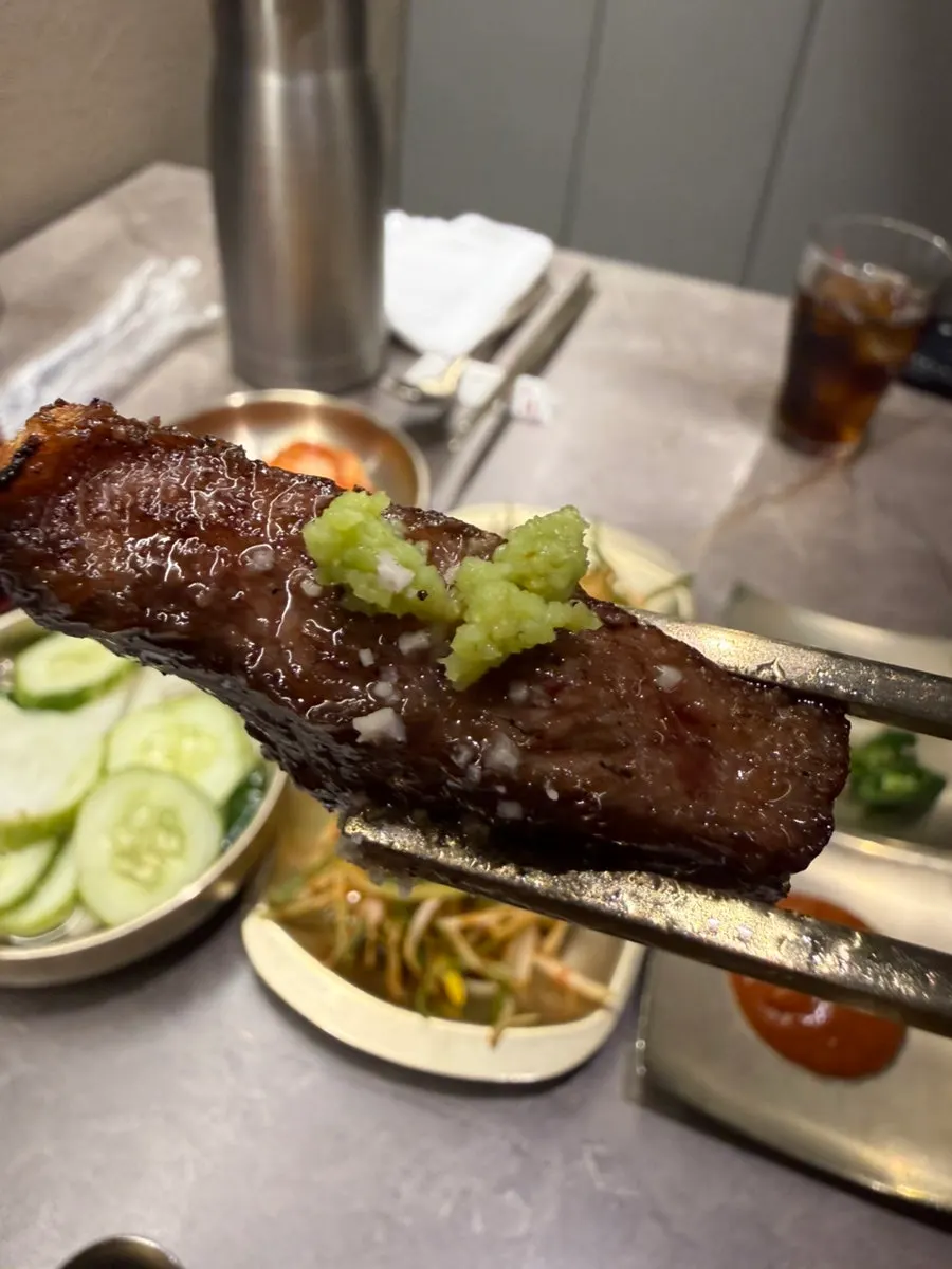 Wasabi placed on juicy hanwoo beef
