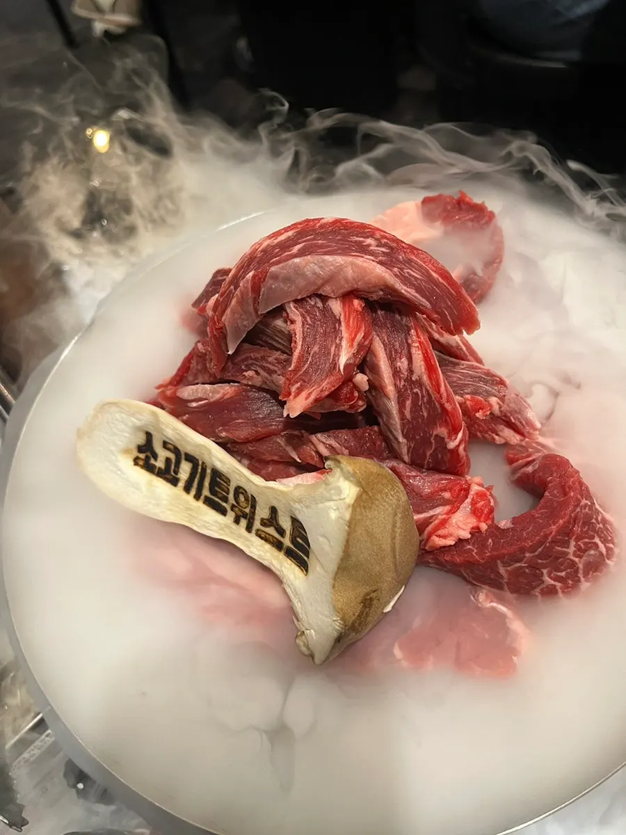 Table setting with salt, garlic, and sauce