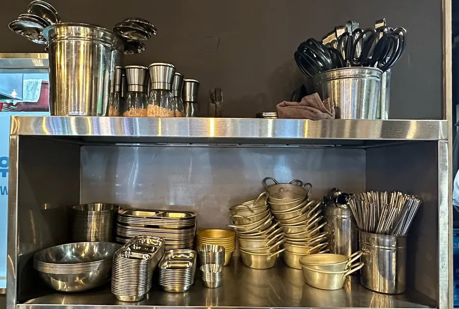 Self-service bar with tableware