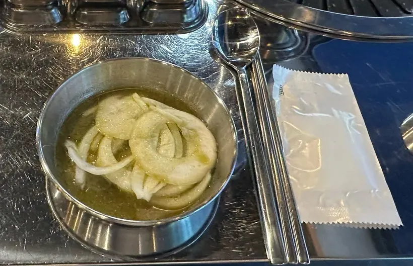 A bowl of seemingly plain pickled onions