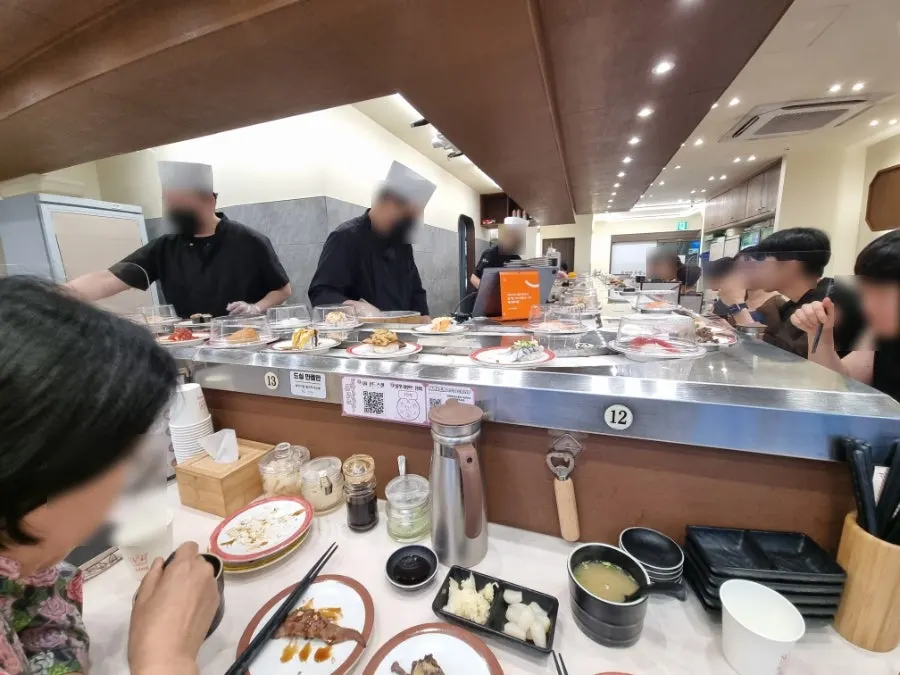 Restaurant interior filling up with evening customers