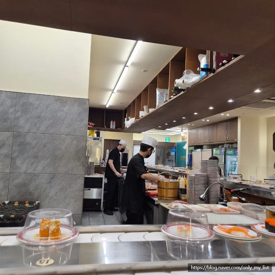 Interior of the restaurant with the conveyor-belt sushi rail