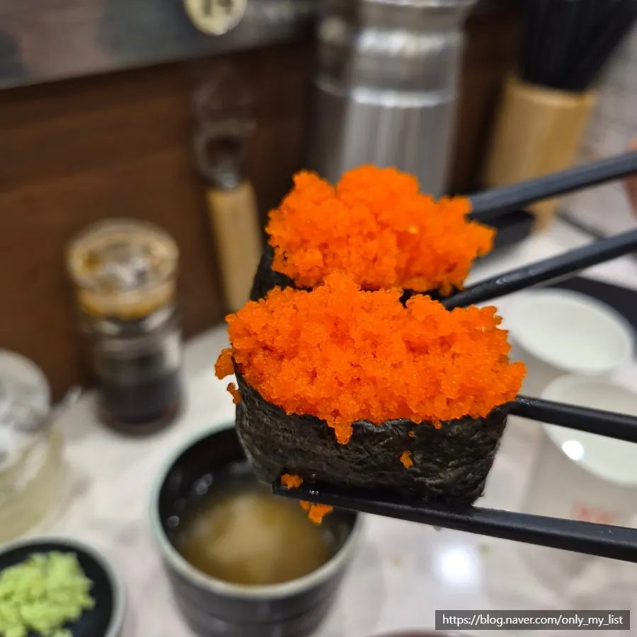 Various types of sushi plates on the conveyor belt