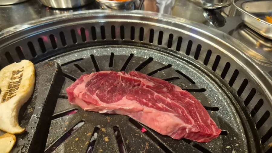 Beef cooking on the grill