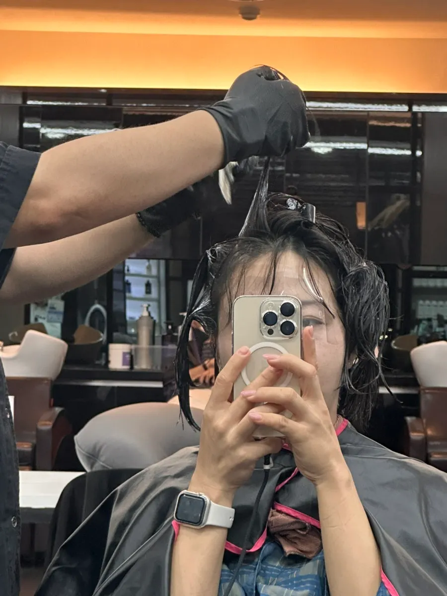 Hair being tidied midway through the treatment