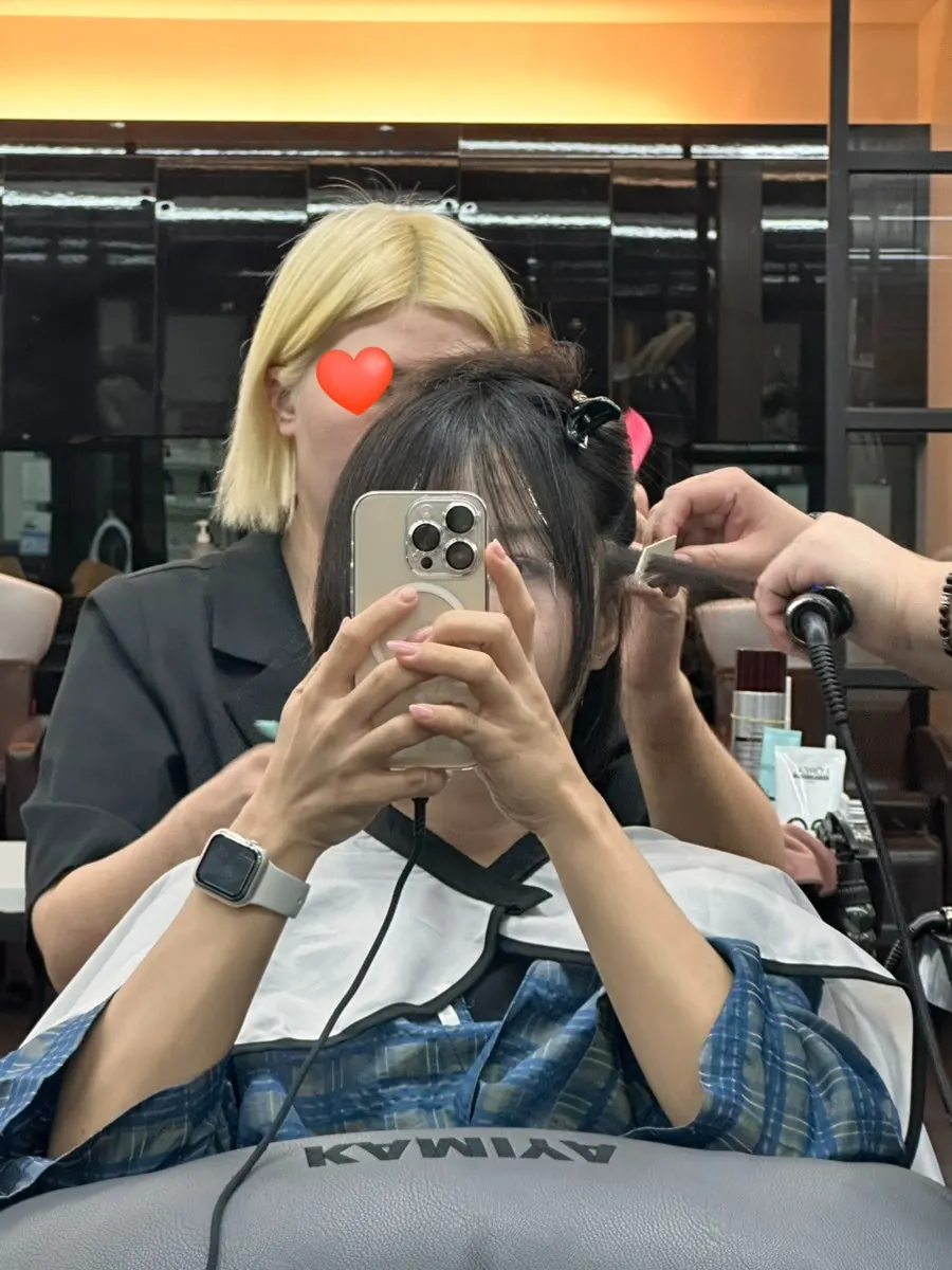 Flat-iron work smoothing the hair