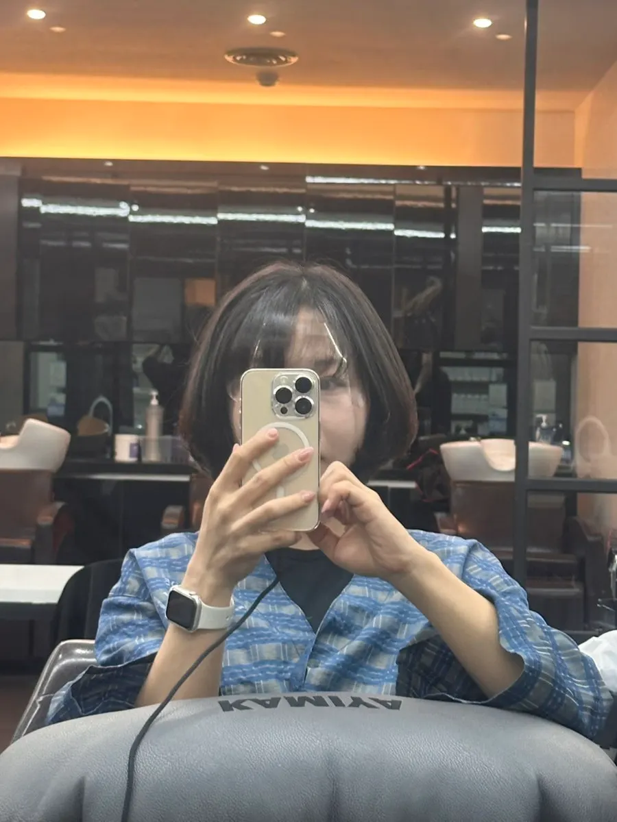 Bob hair being styled with volume kept in