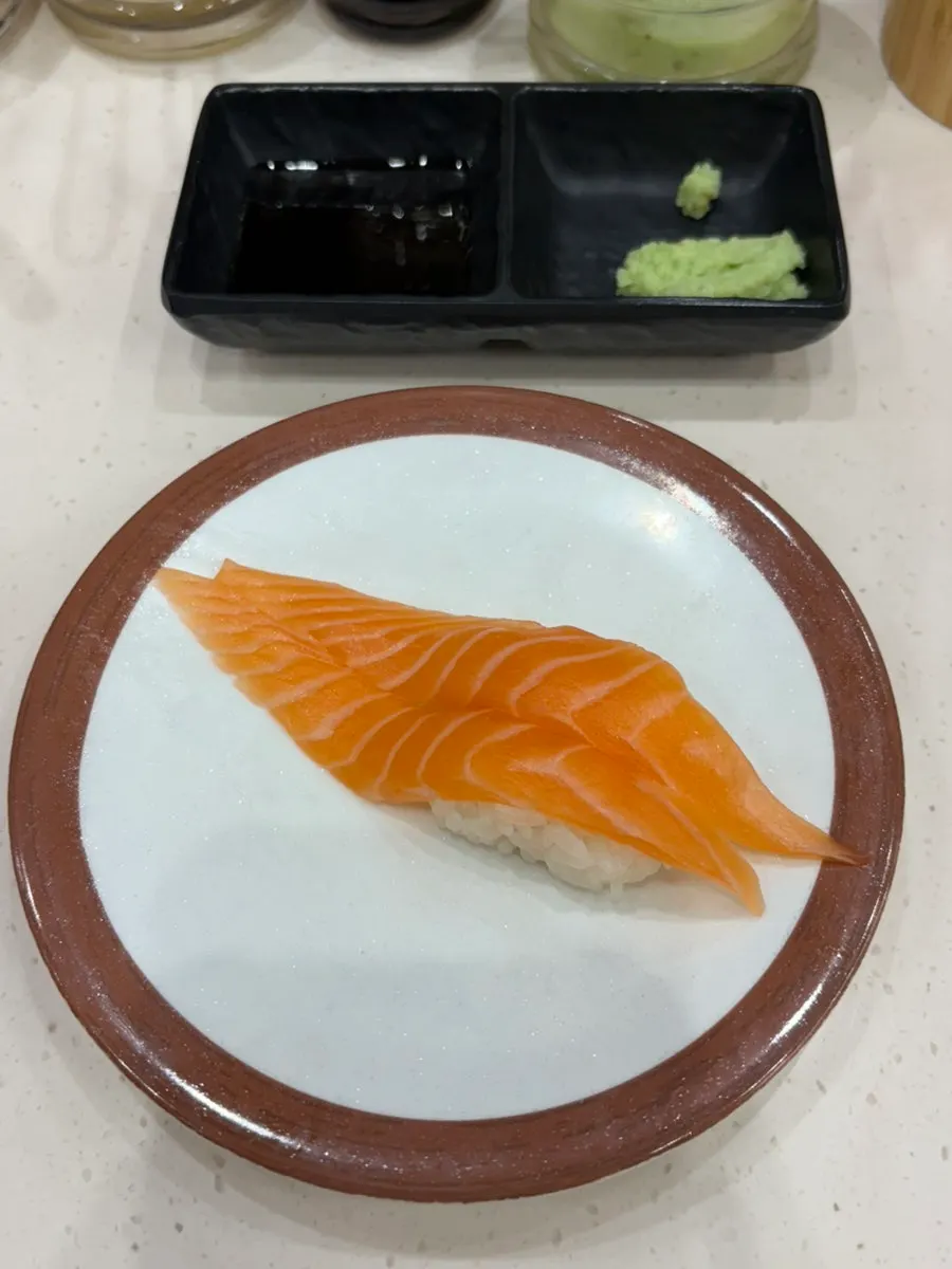A plate of sushi with two pieces