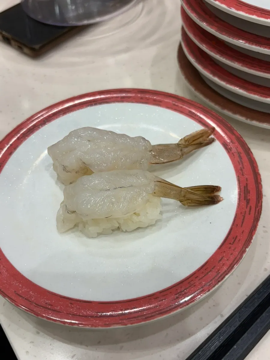 A sushi plate topped with egg