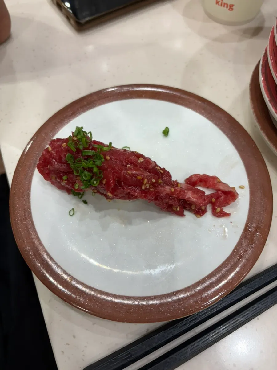 A plate of egg shrimp sushi