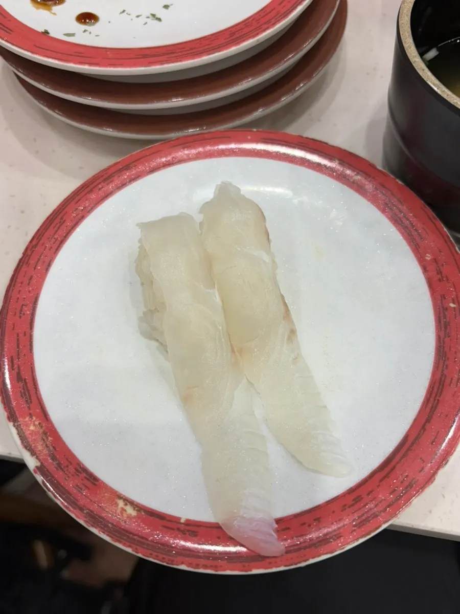 An additional sushi plate ordered