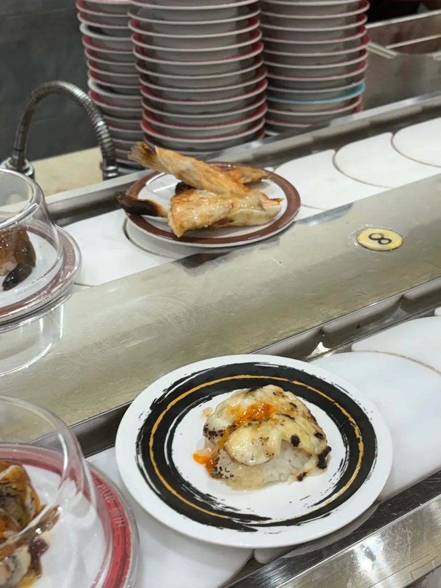 Seating area with a variety of sushi plates