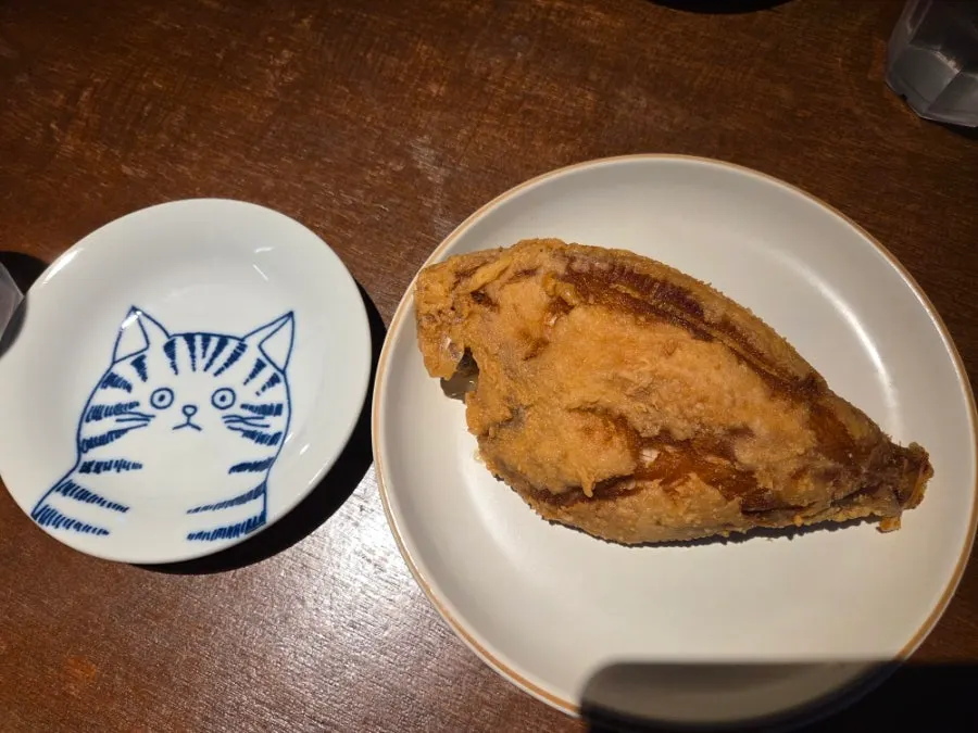 Golden grilled flounder served as a complimentary starter