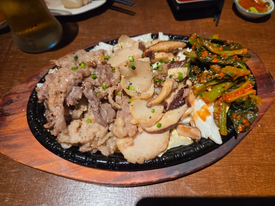 Aged sashimi, six kinds of seafood, and stone sea squirt sake at Susan Jang near Yeongtong Station