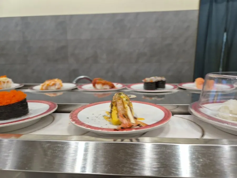 A stack of sushi plates from solo dining