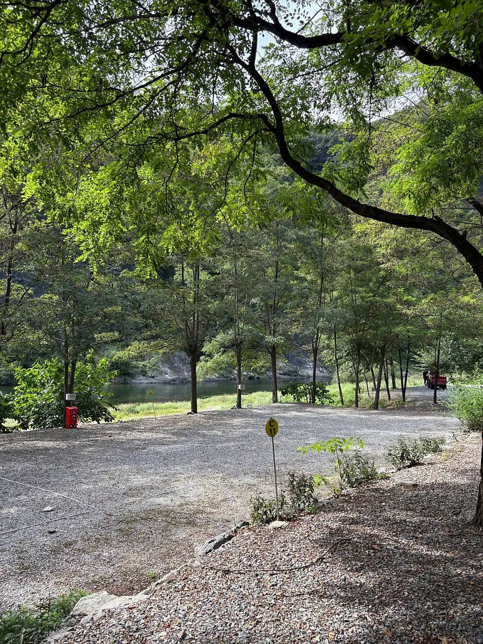 A campsite view in front of the Pyeongchang River at Maru Pension Camping Site