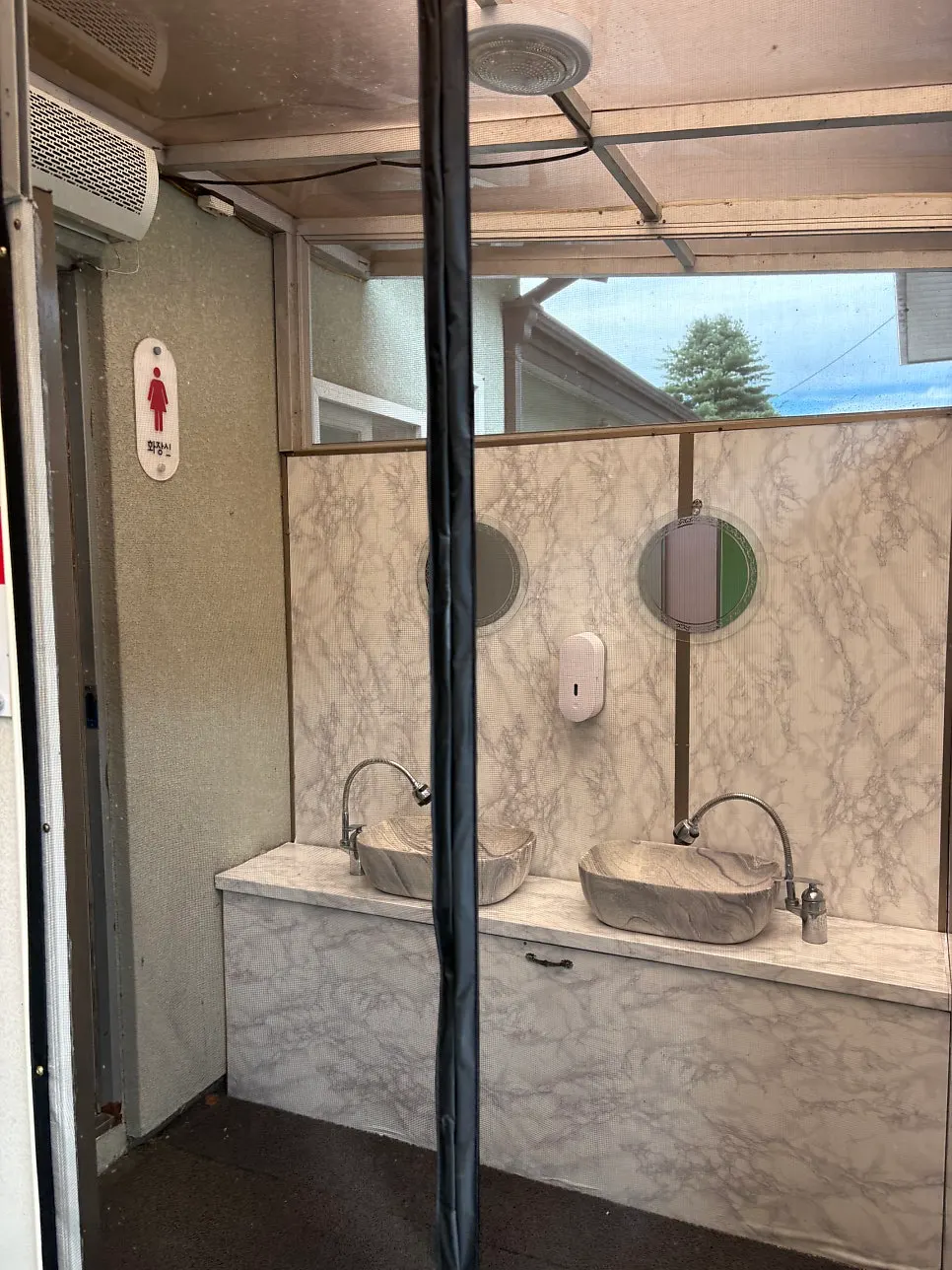Clean, well-maintained shower and restroom building