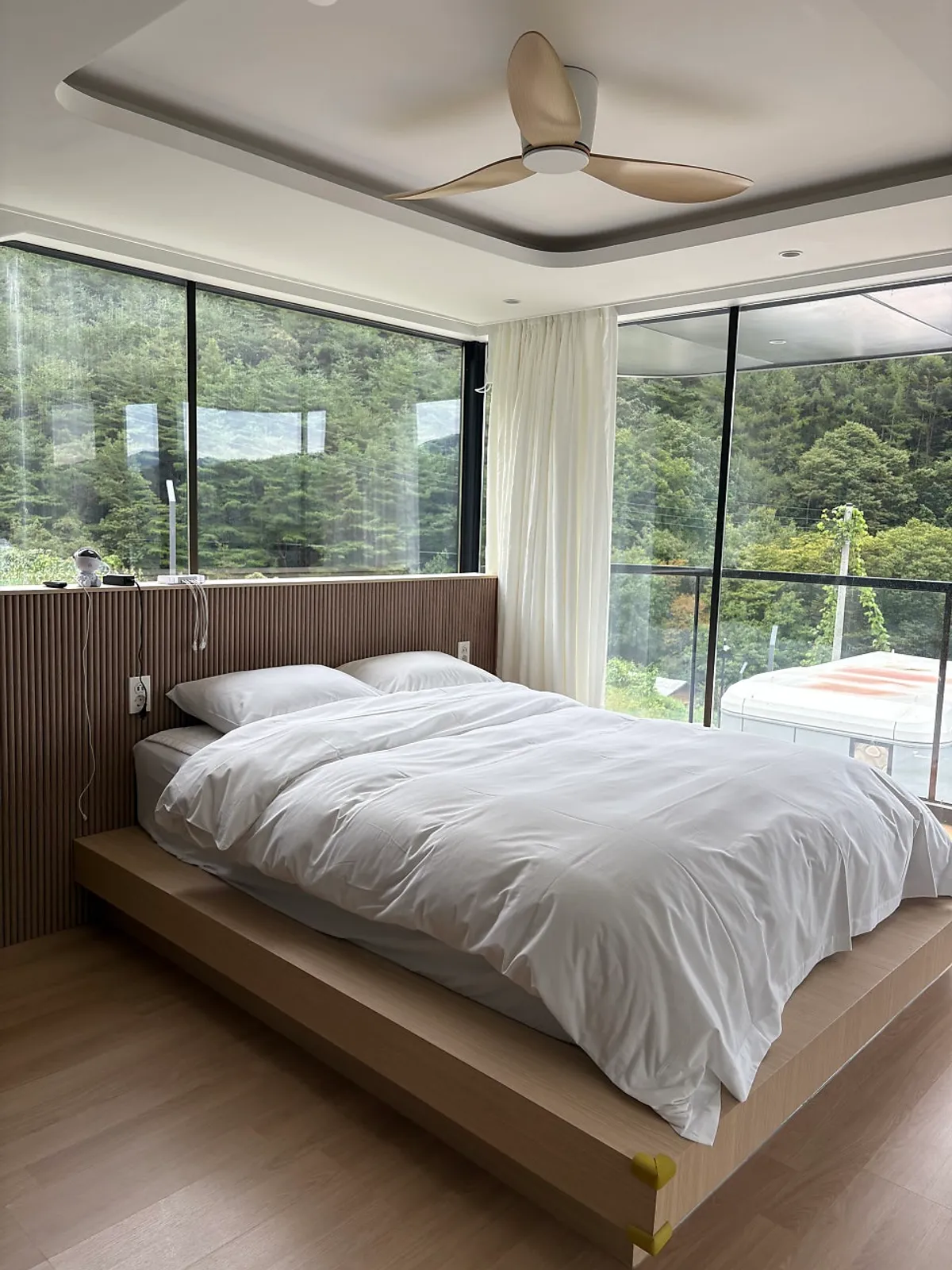 Exterior of Deo Swim's private caravan surrounded by mountains