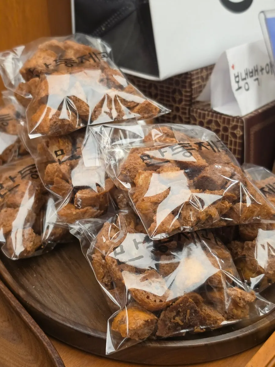 Display case of Emmental and chili sausage breads