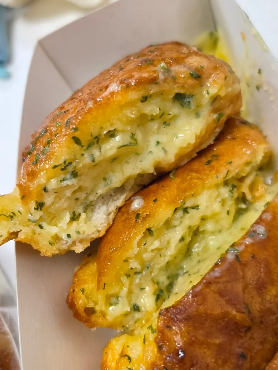 Garlic baguette filled with garlic sauce