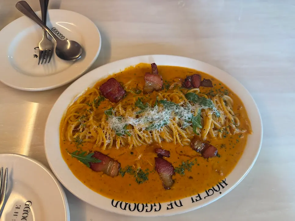 Plate of honey bacon rosé pasta at Hôtel de Couture