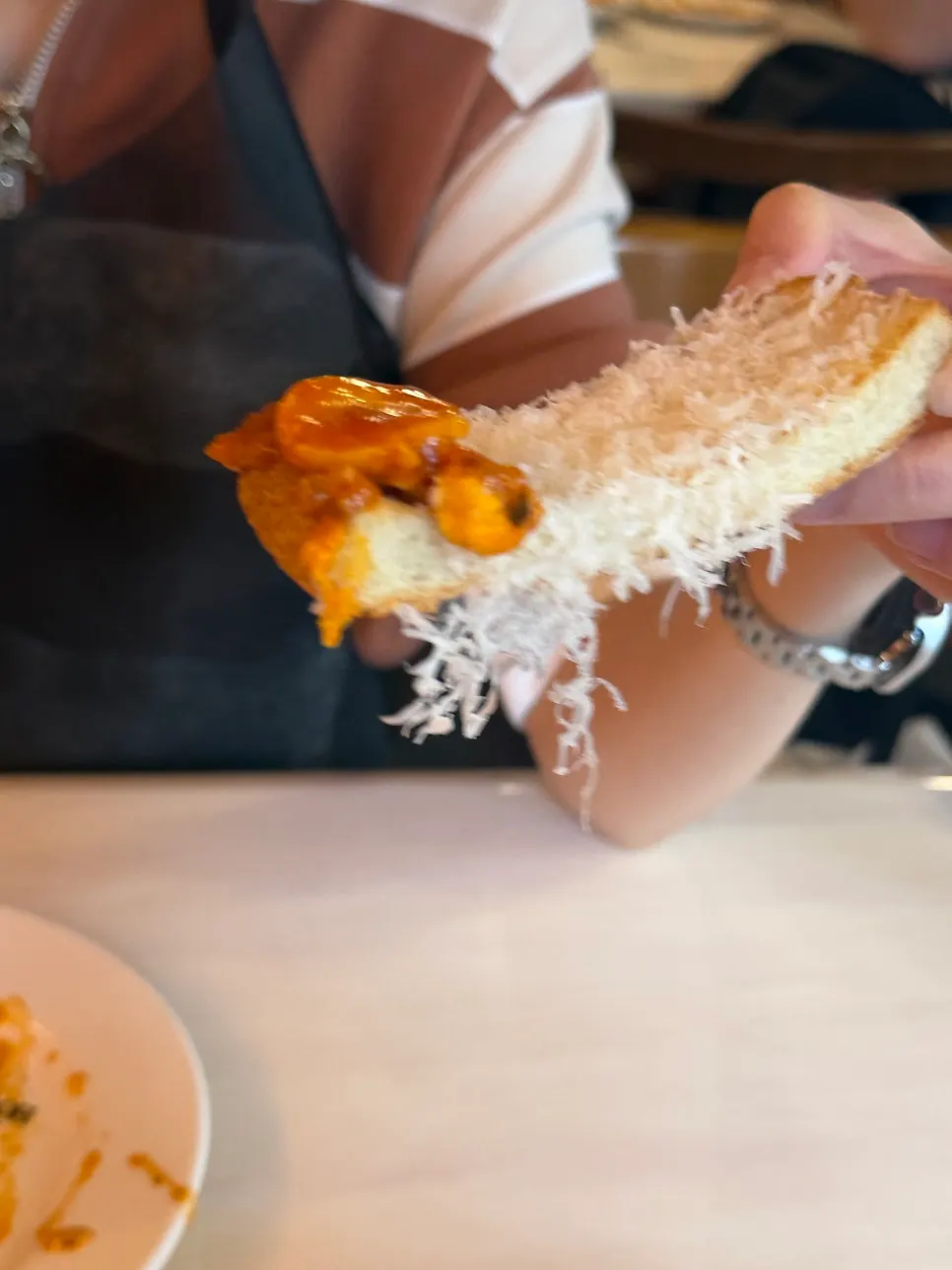 Egg in hell with tomato sauce and a runny egg at Hôtel de Couture