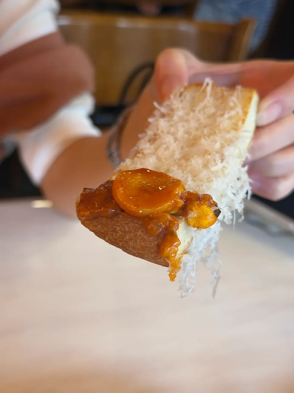 Toasted bread served alongside egg in hell
