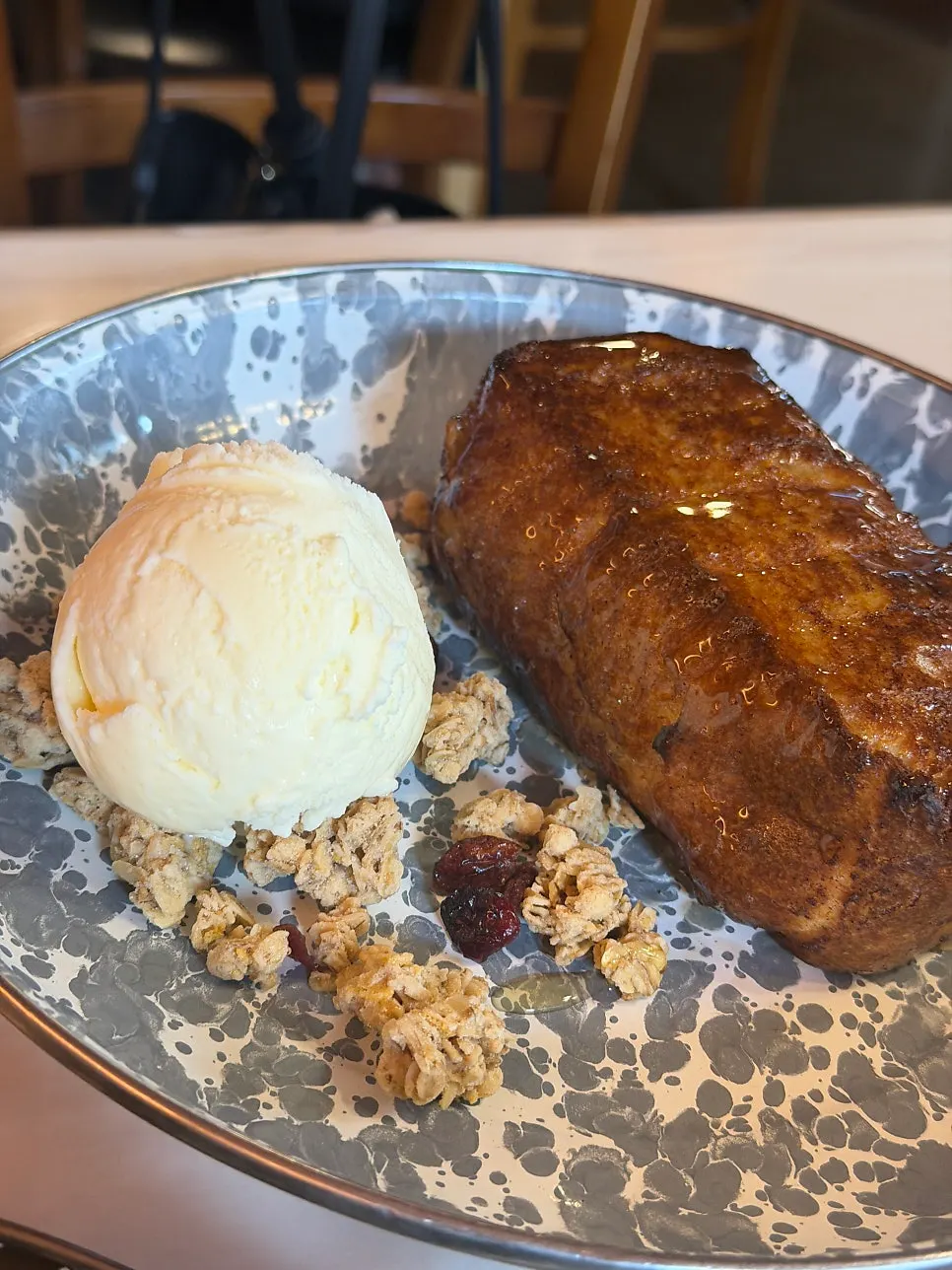 French toast served with vanilla ice cream and oatmeal