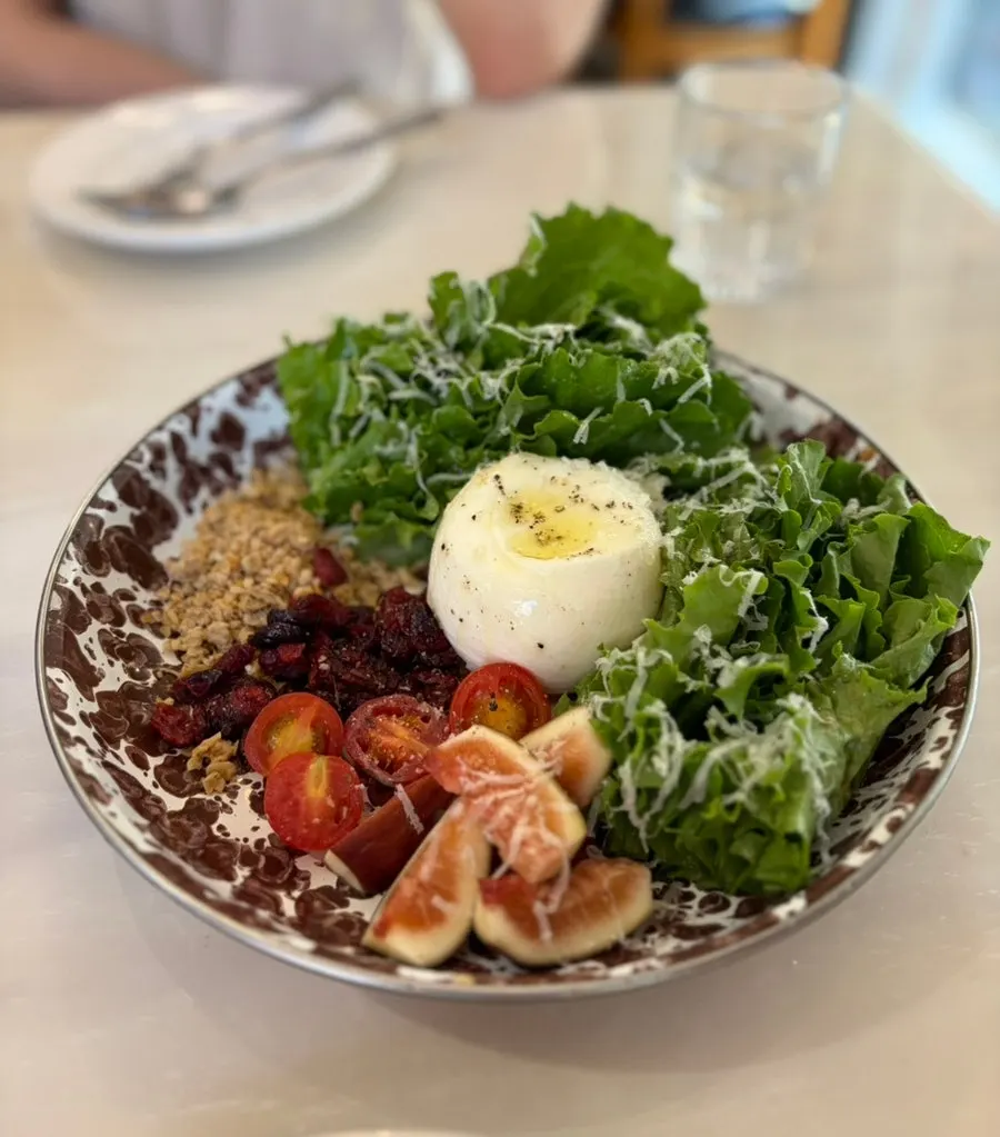 Plate of burrata seasonal fruit salad