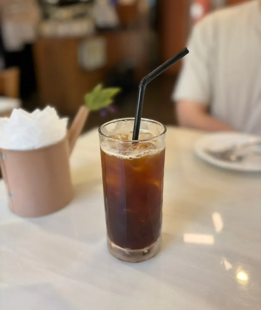 A glass of iced americano at Hôtel de Couture