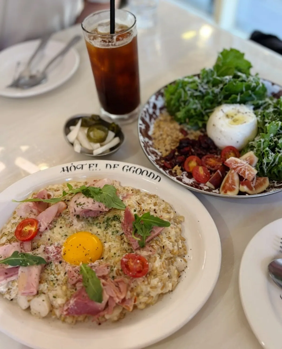 Two brunch plates set under window sunlight