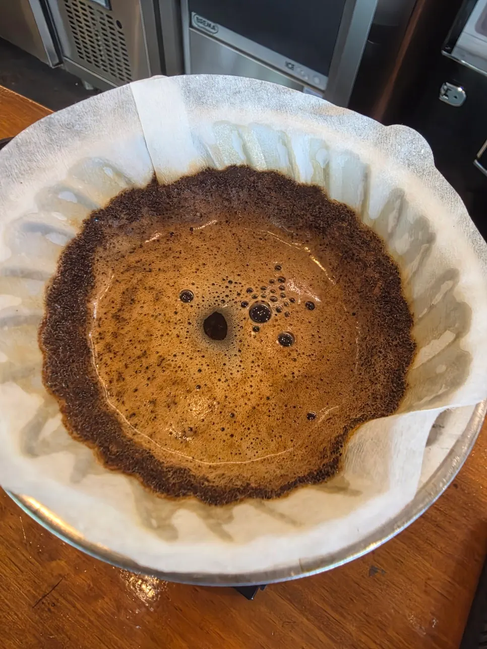 Water being poured into the dripper during hand-drip brewing