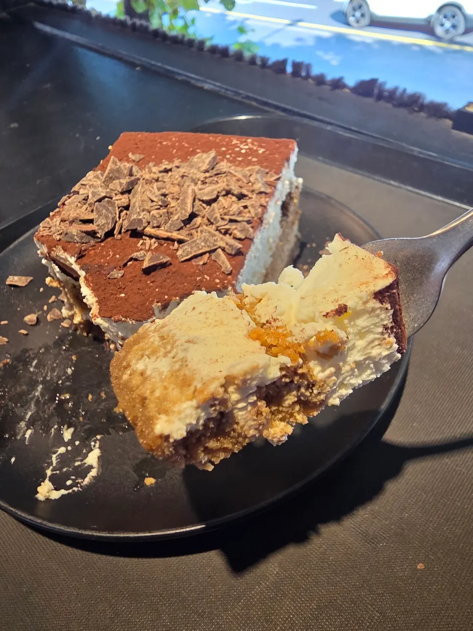 Central Site's signature tiramisu topped generously with chocolate