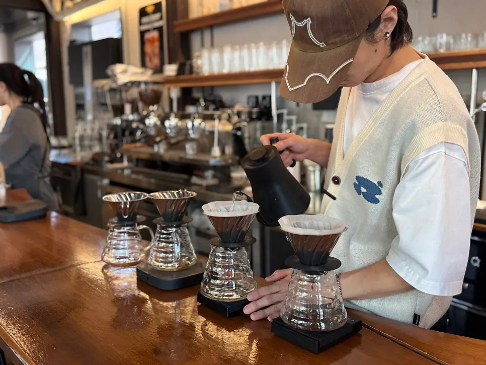 Café bar showing the bean-sniffing process