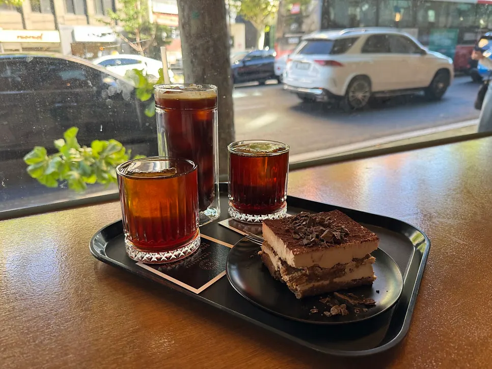 Several coffees lined up for comparison on the table