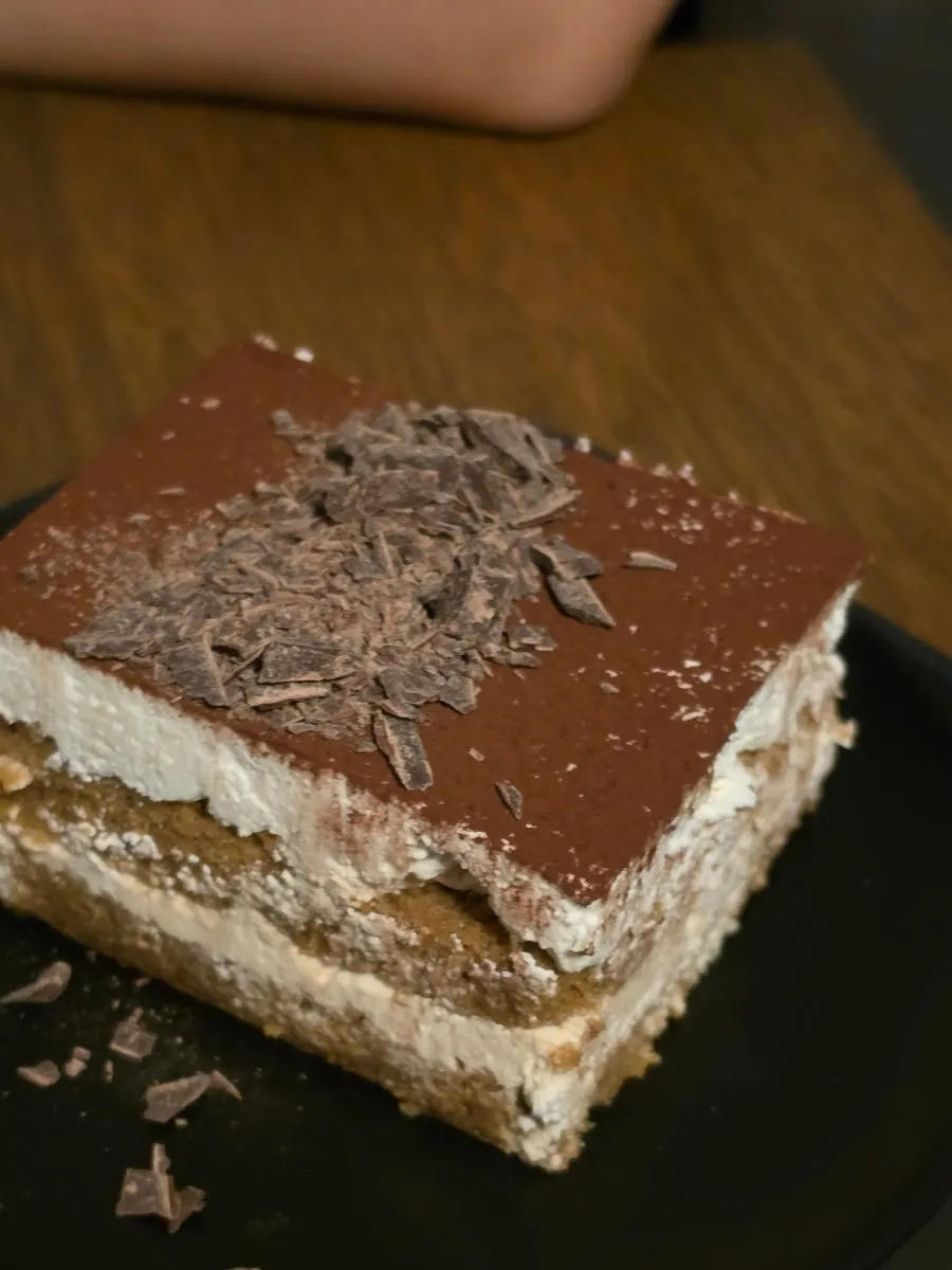 A forkful of moist tiramisu cross-section