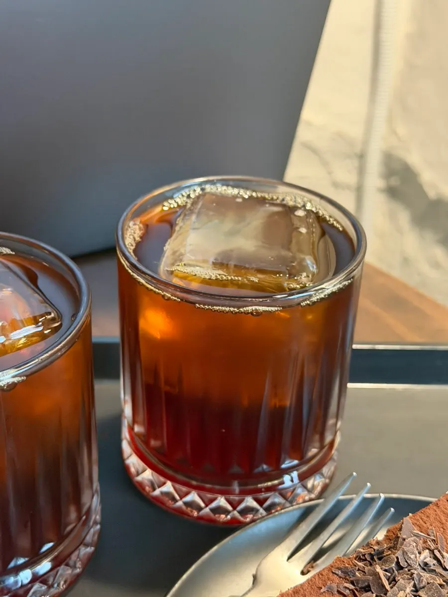 Two brewing coffees placed side by side