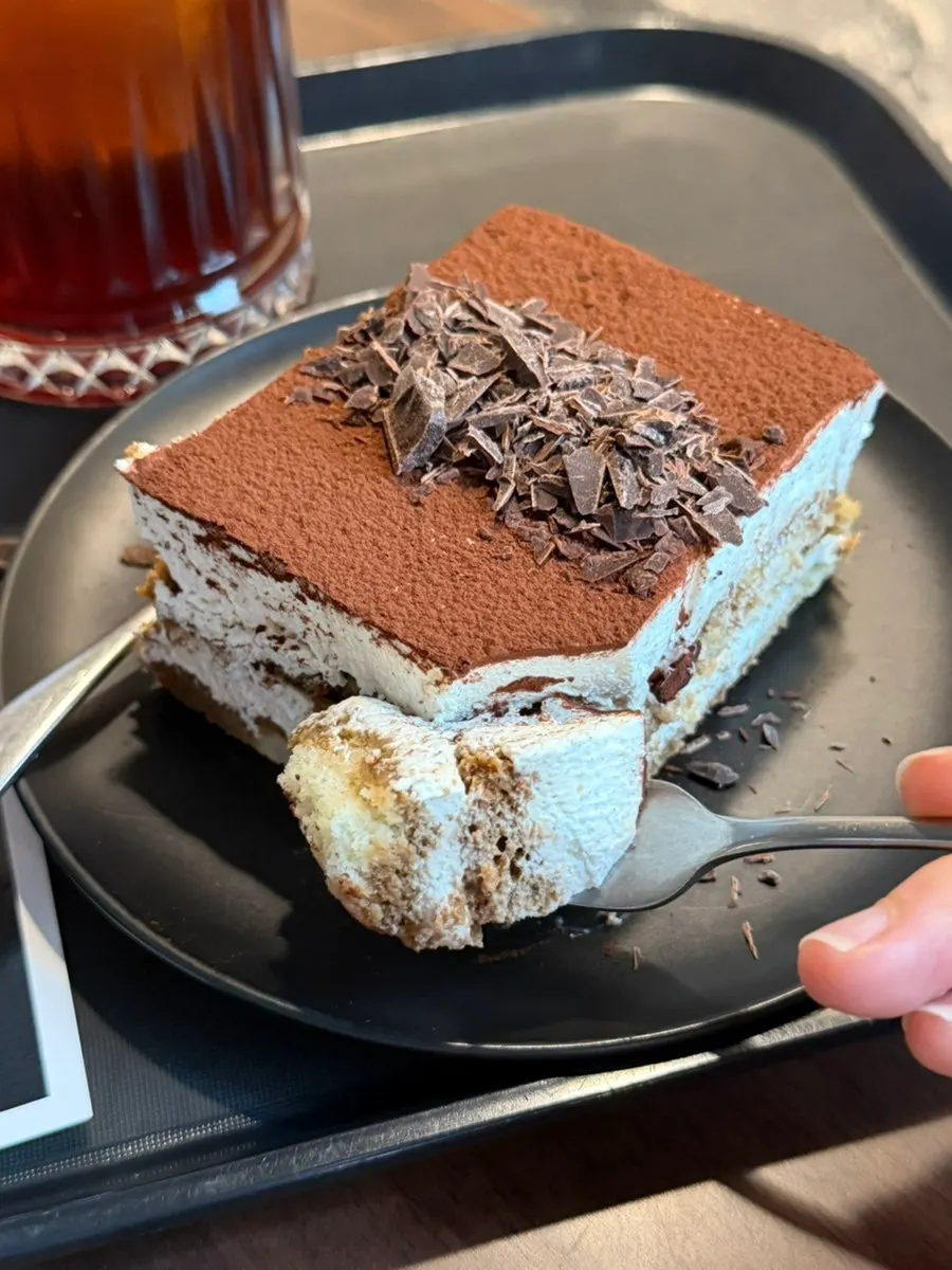 Cross-section of the dense-creamed classic tiramisu