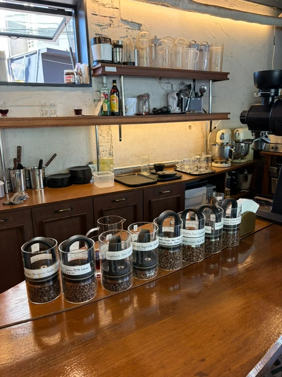 The hand-drip bar inside the first floor with beans lined up