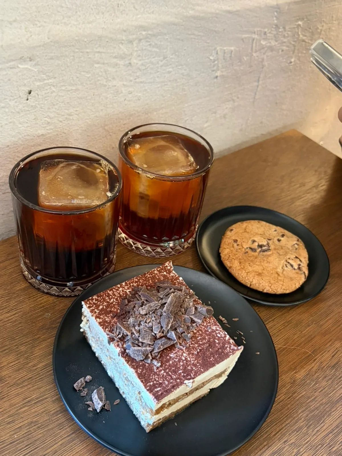 Two cups of hand-drip coffee at a window seat on the second floor